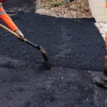 Workers,Repairing,Holes,In,The,Street