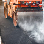 Vibration,Roller,Compactor,Lay,New,Asphalt,Surface,In,Wintertime.,Road