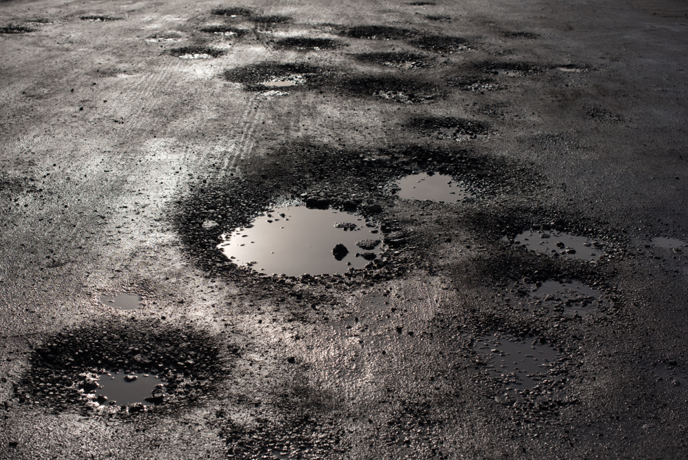 Potholes,In,The,Road,Looking,Like,Alien,Craters