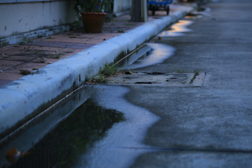 Water,Puddle,On,The,Street.,Poor,Drainage,System,Left,Water